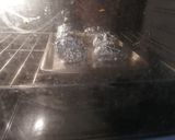 A picture of step 4 of Baked Potatoes Stuffed with Mushrooms, Chorizo, and Chipotle Cream.
