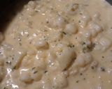 A picture of step 4 of Hominy and Cauliflower in a Cheesey Sauce.