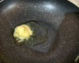 A picture of step 3 of Cracked Dryfruit Wheat Halwa.
