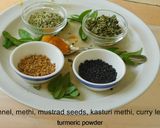 A picture of step 1 of Vaththal kuzhambu with brinjal and sundaikkai vaththals.