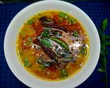 A picture of step 4 of Masoor Dal with Tomato and Curry Leaf Tadka.