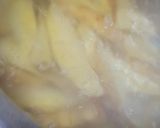 A picture of step 2 of Simple Potato Wedges.