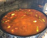 A picture of step 8 of Paella with Vegetables and Meat.