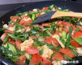 A picture of step 8 of Stir-Fried Eggs with Tomatoes and Green Garlic.