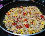 A picture of step 6 of Thai style fried rice with vegetables and tofu.