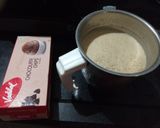 A picture of step 2 of Cold coffee with ice cream.