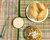 A picture of step 8 of Luchi Ghugni.