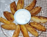 A picture of step 6 of Peri Peri Potatoes.