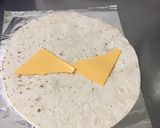 A picture of step 5 of Breakfast Burritos.