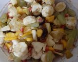 A picture of step 3 of Ramadhan special fruit chat.