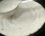 A picture of step 2 of Crispy dosa in iron tawa.