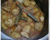 A picture of step 8 of Muthiya (wheat flour)with Masala veggies.