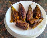 A picture of step 3 of Andhra style stuffed karela.