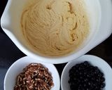 A picture of step 4 of Pecan-Black Currant Pound Cake.