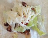 A picture of step 5 of Quick chilli, bean n salad wrap.