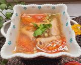 Hình bước làm 2 của món Canh cà chua nấu chân gà