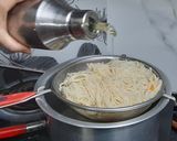 A picture of step 2 of Cheesy garlic chowmin.