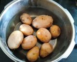 A picture of step 1 of Super healthy rajgira flour potato sabudanaPowder farali tasty cutlet with masala curd.