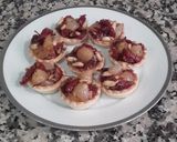 Foto del paso 10 de la receta Mini tartaletas de pasta brisa rellenas de cebollitas caramelizadas