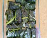 A picture of step 9 of Dirty rice collard rollups.