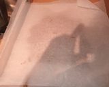 Foto del paso 2 de la receta: Cuadraditos de avena sabor naranja con pasas y chocolate