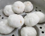 A picture of step 4 of Paneer Manda Pitha(rice flour dumplings).