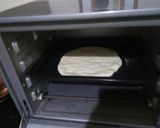 A picture of step 4 of Spinach Alfredo pizza (homemade base).