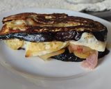Foto del paso 10 de la receta: Sándwich de berenjena🍆con pera y queso🧀🍯🧅🍐