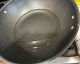 A picture of step 1 of Shrimp with Black Bean Sauce.