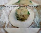 A picture of step 12 of Alu wala naan.