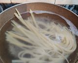 A picture of step 2 of Aglio e olio fettuccine.