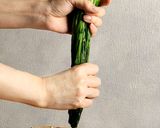 A picture of step 6 of Blanched spinach with sesame dressing.