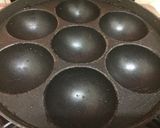 A picture of step 8 of Sweet paniyaram / kulipaniyaram / paddu.