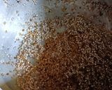 A picture of step 2 of Broken Wheat Kheer with pumpkin seeds.