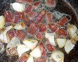 Foto del paso 2 de la receta Guisantes al ajillo con jamón