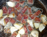 Foto del paso 2 de la receta: Guisantes al ajillo con jamón