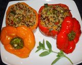 A picture of step 4 of Stuffed peppers with three colors quinoawalnuts and raisins.