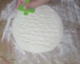 A picture of step 5 of Tiloon wala naan (saseme flat bread).