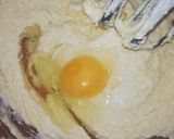A picture of step 2 of Red Velvet çhoçolate inside Cupcakes with cream cheese frosting.