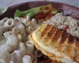 A picture of step 8 of Veg Sizzler with Paneer Steak and creamy Pasta.