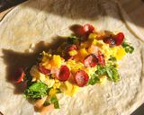 A picture of step 1 of Deluxe Pizza Breakfast Wraps.