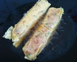 A picture of step 4 of Five-Spice Chicken Rolls.