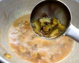A picture of step 9 of Pavakkai /bitter gourd pitlai.