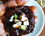 A picture of step 8 of Dry fruits stuffed coconut laddoo.