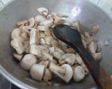 A picture of step 2 of Mushroom fry.