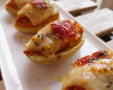 Foto del paso 7 de la receta: Patatas rellenas de boloñesa gratinadas