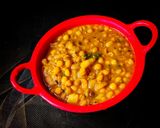 A picture of step 4 of Ghooguni (Spicy White peas curry).