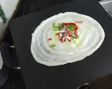 A picture of step 3 of Cheesy Jini Dosa.