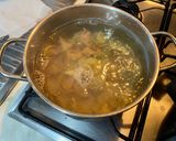 A picture of step 6 of Sombreri with Zucchini Flower Pesto and Clams.