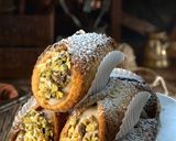 Foto del passaggio 6 della ricetta Cannoli di Pandoro Ripieni di Ricotta con Canditi e Cioccolato